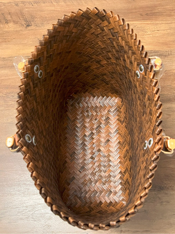 A beautifully designed and spacious woven straw bag