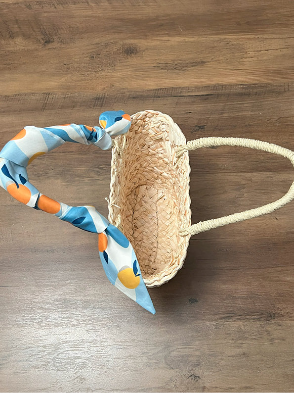 A beautifully designed and spacious woven straw bag